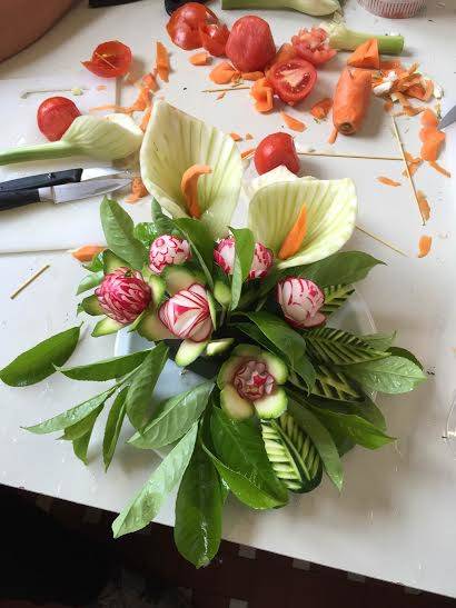 Fiori, foglie e animali creati con i vegetali