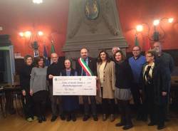 consegna assegno caritas