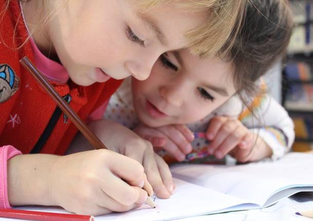 bambini scuola doposcuola compiti