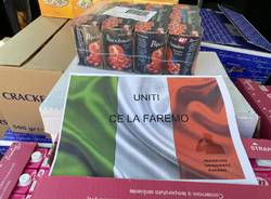 polizia busto pacchi alimentari coronavirus