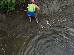 Lavori al greto del torrente Lura