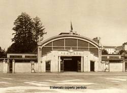 Metamorfosi urbana: il mercato coperto perduto, il mercato coperto mai nato e il teatro provvisorio divenuto stabile