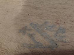 tatuaggi vittima vanzaghello lonate pozzolo