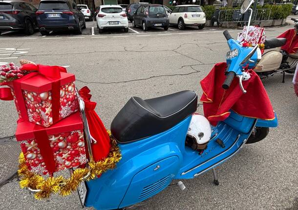 La vespa travestita da slitta che porta un sorriso per i paesi del Verbano